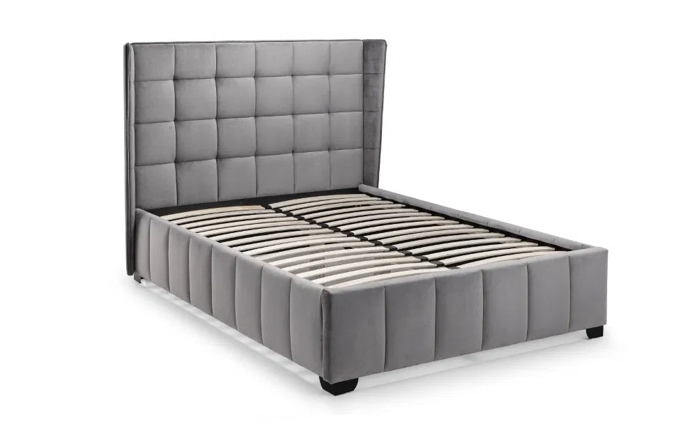 Gray upholstered bed with tufted headboard on a white background | Grey Velvet