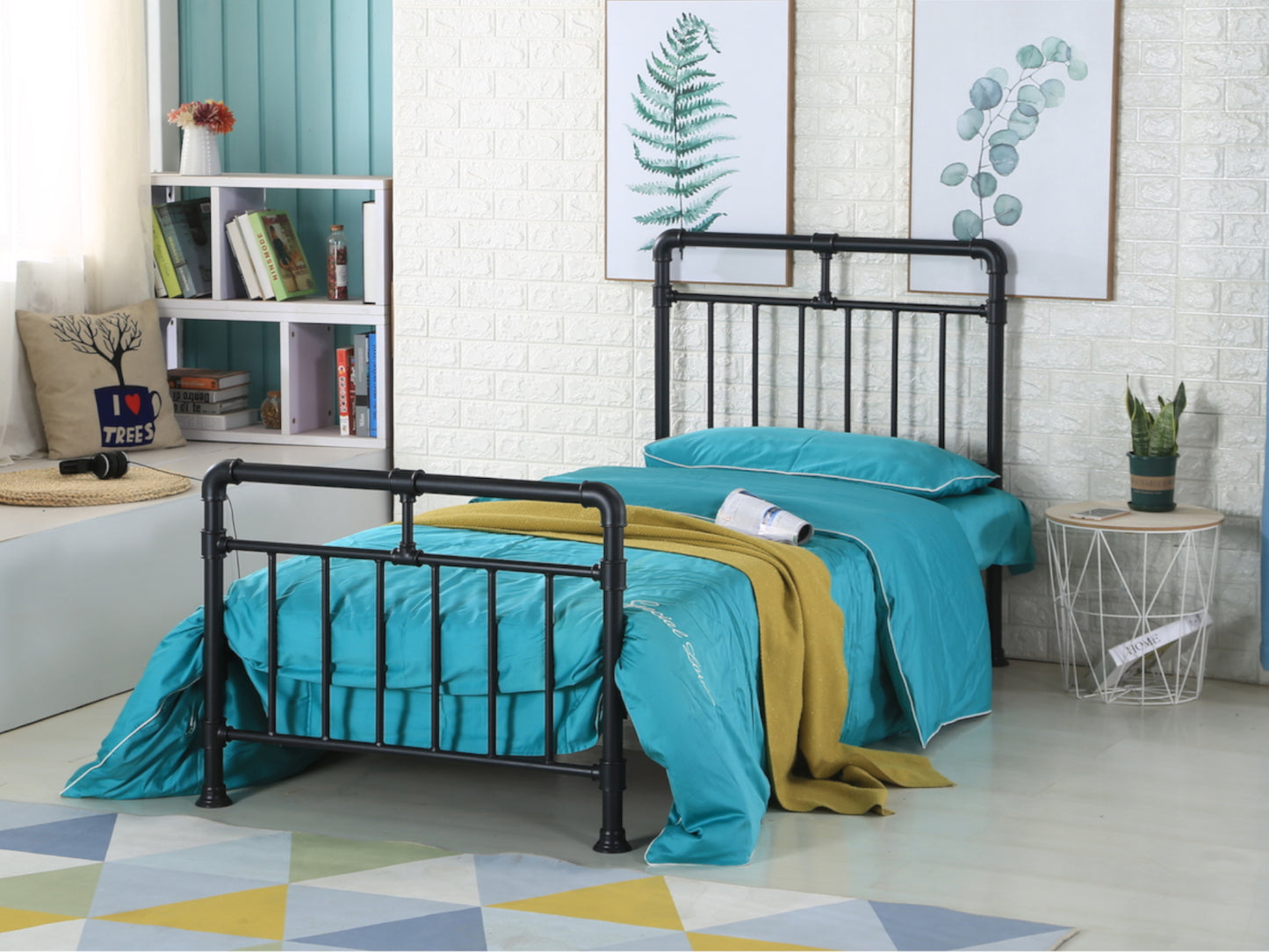 A black pipe industrial bed frame in a room with turquoise and yellow bedding, wooden slatted base, and a bookshelf in the background. | Black