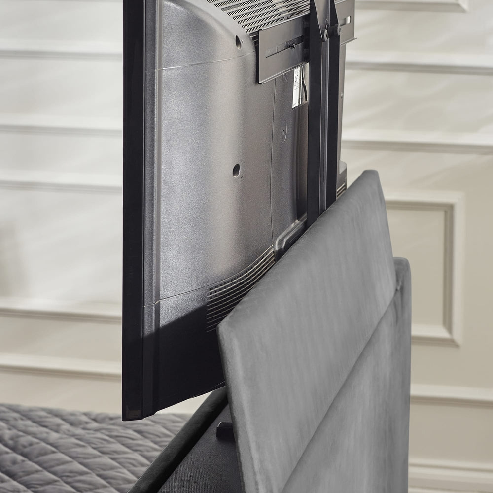 TV mounted on the bed with a neutral background | Dark Grey