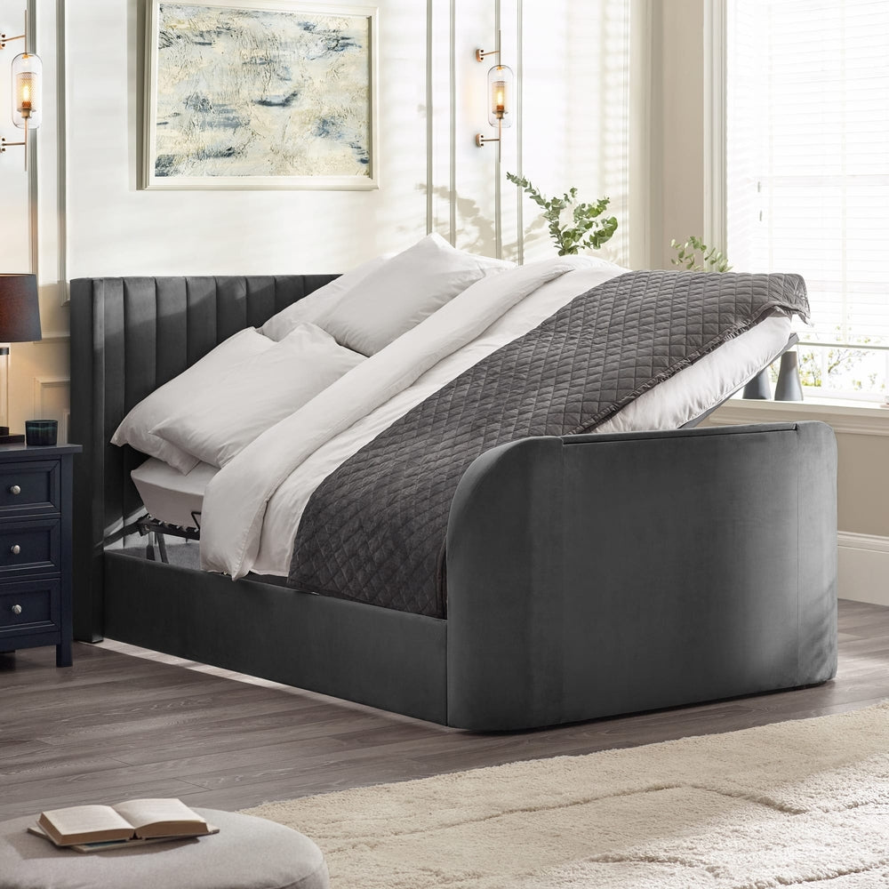 Modern bedroom with a gray upholstered bed, white bedding, and decorative elements | Dark Grey