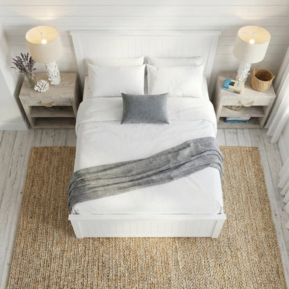 Bedroom with a neatly made bed, nightstands, and lamps | Surf White