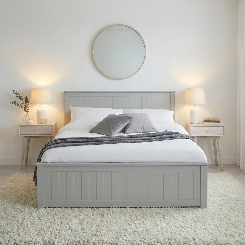 Gray bed with white bedding in a bedroom setting with lamps and decor | Dove Grey